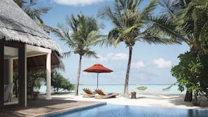 Outdoor pool, pool umbrellas, sun loungers