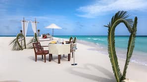 Private beach, white sand, free beach cabanas, sun loungers