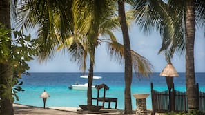 Private beach, white sand, free beach cabanas, sun loungers