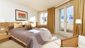 Premium bedding, down comforters, minibar, in-room safe