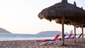 Beach nearby, sun loungers