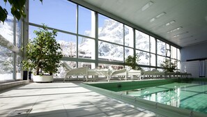 Indoor pool, outdoor pool, pool umbrellas, sun loungers