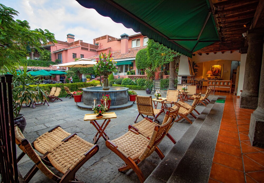 Outdoor dining, Las Mananitas Hotel Garden Restaurant and Spa