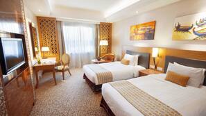 Pillow top beds, minibar, in-room safe, desk