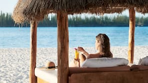 Private beach, white sand, free beach cabanas, sun-loungers