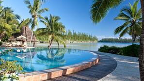 Outdoor pool, open 7:00 AM to 7:00 PM, free pool cabanas, pool umbrellas