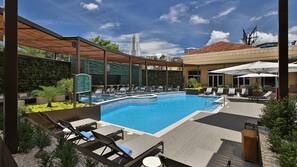 Outdoor pool, pool umbrellas, sun loungers