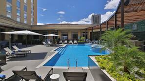 Outdoor pool, pool umbrellas, sun loungers