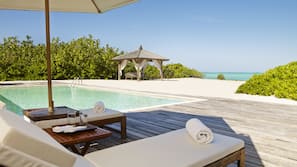 2 outdoor pools, pool umbrellas, pool loungers
