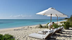Private beach, white sand, beach towels, waterskiing