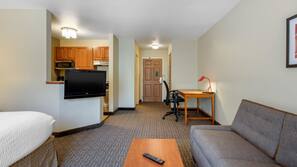 Desk, laptop workspace, blackout drapes, iron/ironing board