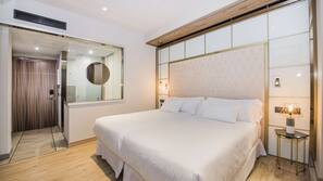 Ropa de cama de alta calidad, minibar, caja fuerte y escritorio