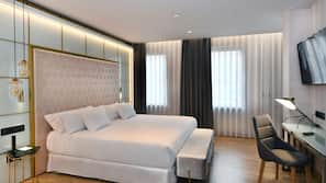 Ropa de cama de alta calidad, minibar, caja fuerte y escritorio