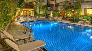 Seasonal outdoor pool, open 8:30 AM to 3:00 PM, pool umbrellas