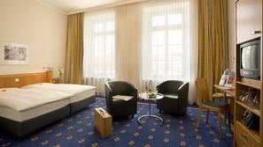Literie hypoallergénique, minibar, coffre-forts dans les chambres