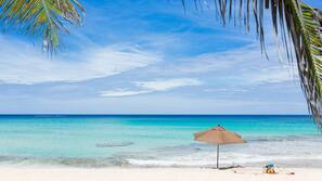 Private beach, white sand, sun-loungers, beach towels