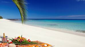 Private beach, white sand, sun-loungers, beach towels