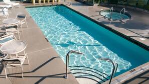 Outdoor pool, open 6:00 AM to 10:00 PM, sun loungers