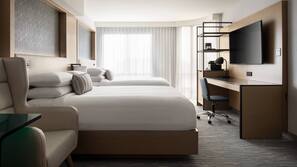Premium bedding, down comforters, pillowtop beds, in-room safe