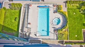 Outdoor pool, open 6:00 AM to 10:00 PM, sun loungers