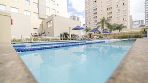 Outdoor pool, pool umbrellas, sun loungers