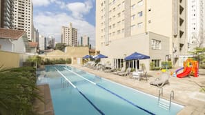Outdoor pool, pool umbrellas, sun loungers