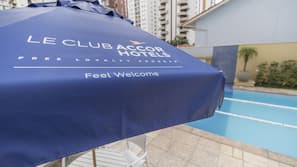 Outdoor pool, pool umbrellas, sun loungers