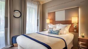 Premium bedding, in-room safe, blackout curtains, soundproofing