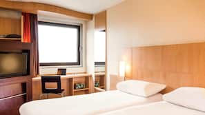 Luxe beddengoed, pillowtop-bedden, een kluis op de kamer, een bureau