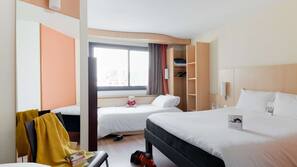 Luxe beddengoed, pillowtop-bedden, een kluis op de kamer, een bureau