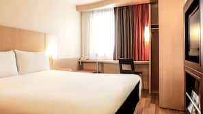 Luxe beddengoed, pillowtop-bedden, een kluis op de kamer, een bureau