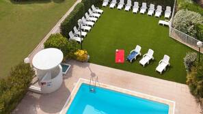 Outdoor pool, pool umbrellas, pool loungers