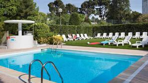 Outdoor pool, pool umbrellas, pool loungers