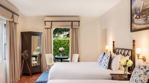 Premium bedding, down comforters, pillowtop beds, minibar