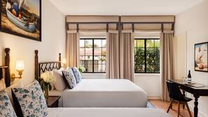 Premium bedding, down comforters, pillowtop beds, minibar