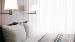 Roupas de cama premium, cofres nos quartos, escrivaninha