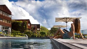 Outdoor pool, pool umbrellas, sun loungers