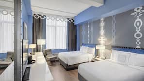Pillowtop beds, desk, blackout drapes, iron/ironing board