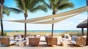 On the beach, beach cabanas, sun loungers, beach umbrellas