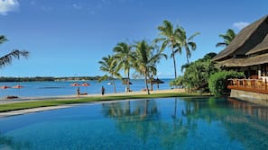2 outdoor pools, pool umbrellas, sun loungers