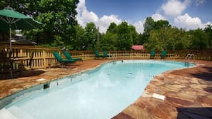Outdoor pool, pool umbrellas, sun loungers