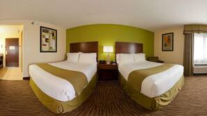 Premium bedding, pillow top beds, desk, laptop workspace