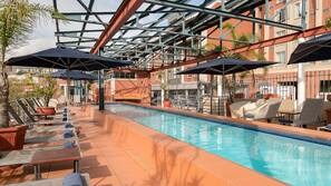 Outdoor pool, open 6:00 AM to 8:00 PM, pool umbrellas, pool loungers