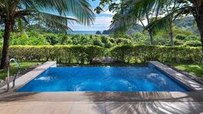 2 outdoor pools, pool umbrellas, sun loungers