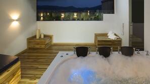 Bañera de hidromasaje al aire libre