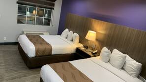 Premium bedding, pillow top beds, desk, laptop workspace