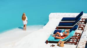 Private beach, white sand, free beach cabanas, sun-loungers