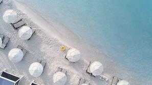 Private beach, white sand, free beach cabanas, sun-loungers