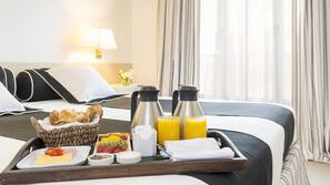 Premium bedding, down comforters, pillowtop beds, minibar