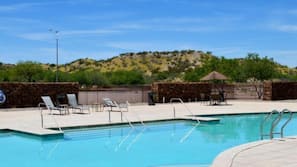 Outdoor pool, pool umbrellas, sun loungers